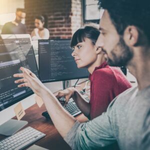 img of people looking at a computer